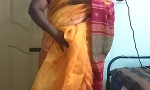 desi  indian horny tamil telugu kannada malayalam hindi cheating wife vanitha wearing orange affect unduly saree  showing big boobs and shaved pussy press fixed boobs press nip rubbing pussy masturbation