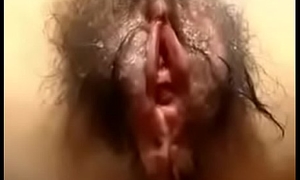 Hairy Asian explicit masturbations on her period